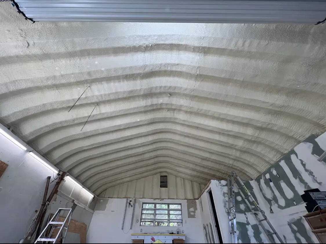Spray polyurethane foam applied to the underside of a metal roof deck in Bothell East